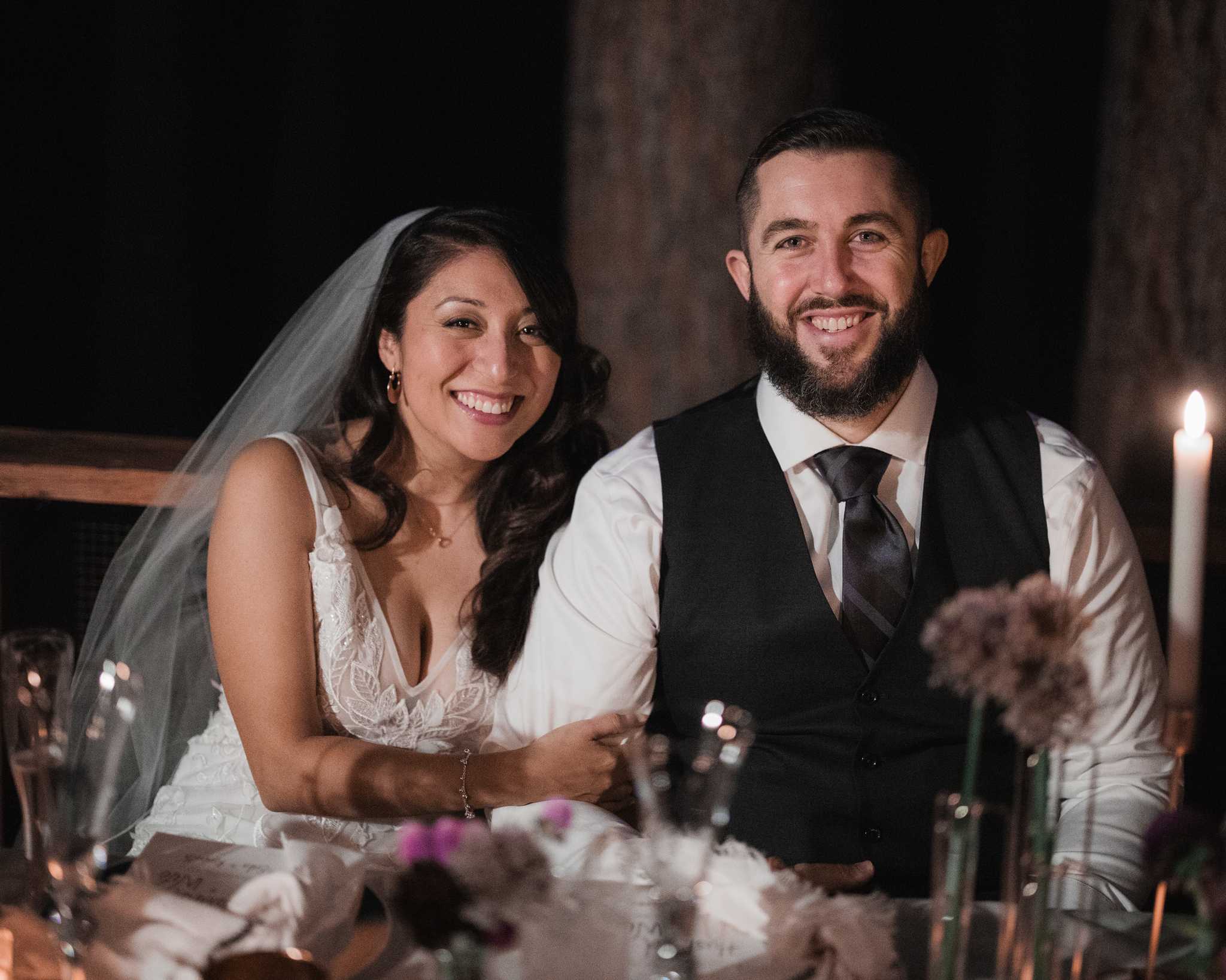 Erika and Ken sitting at their table